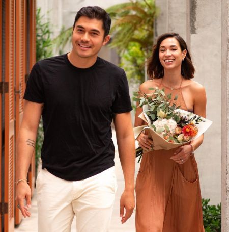 Henry Golding and his wife Liv Lo.